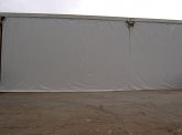 Telo in PVC per chiusura capannone industriale. Anno 2009