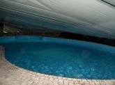 Copertura su misura in PVC con tiranti in acciaio per piscina- Anno 2004